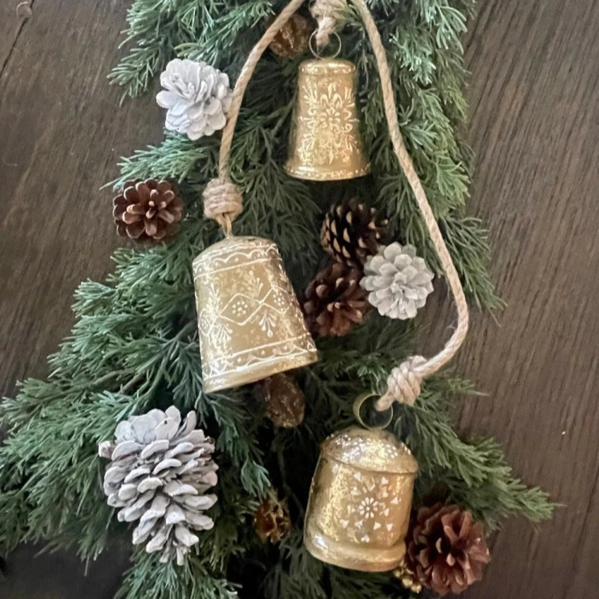 3 gold bells with jute and henna paint